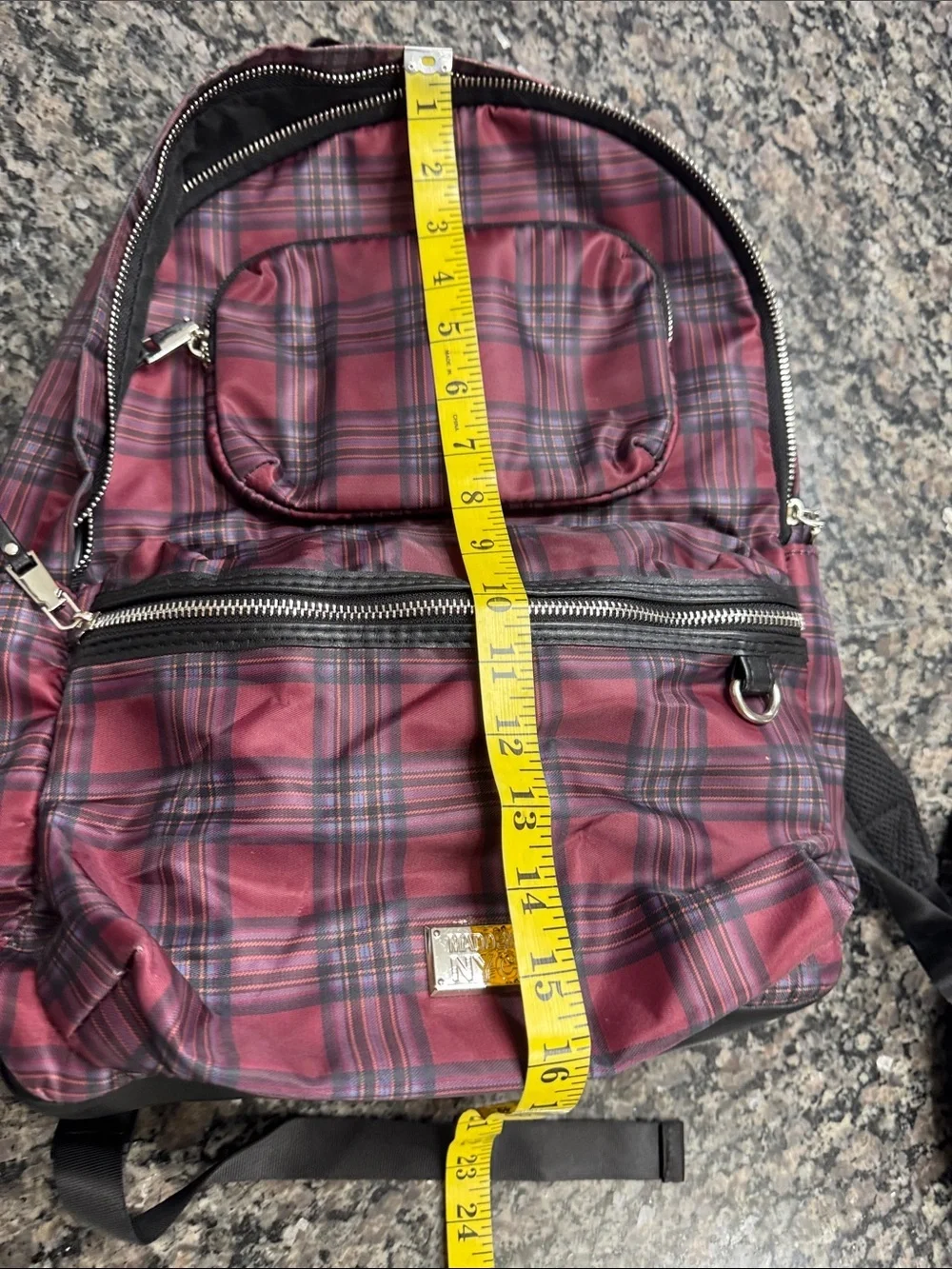 Madden NYC Burgundy Plaid Backpack with Front Zip Pocket shiny silver hardware